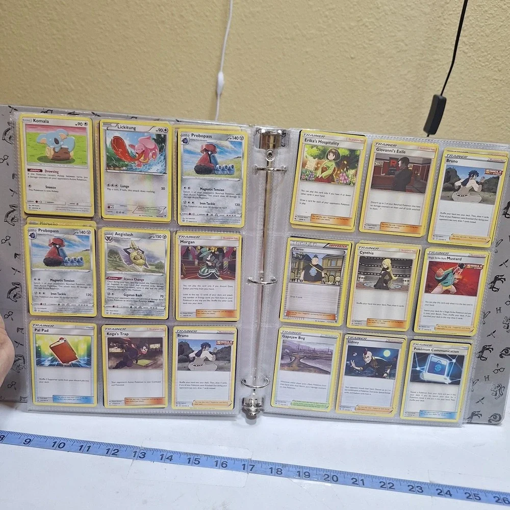 Pokémon TCG binder collection lot with approximately 171 cards from multiple set